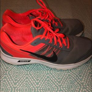 Men’s orange and gray  tennis shoes